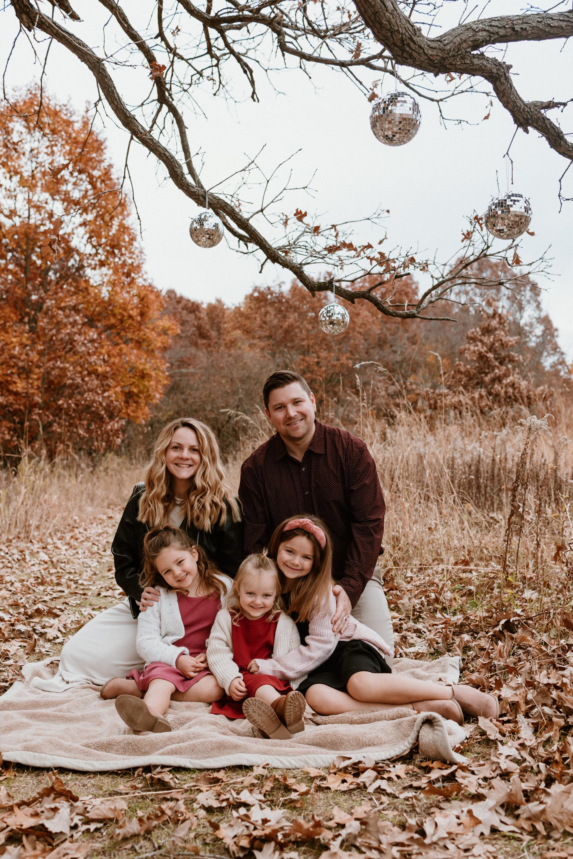 Headshot of Taylor Van Winkle outside with a fall background